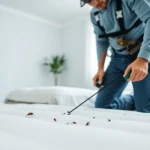 Effective bed bug extermination near me with an expert inspecting a mattress in a modern home.